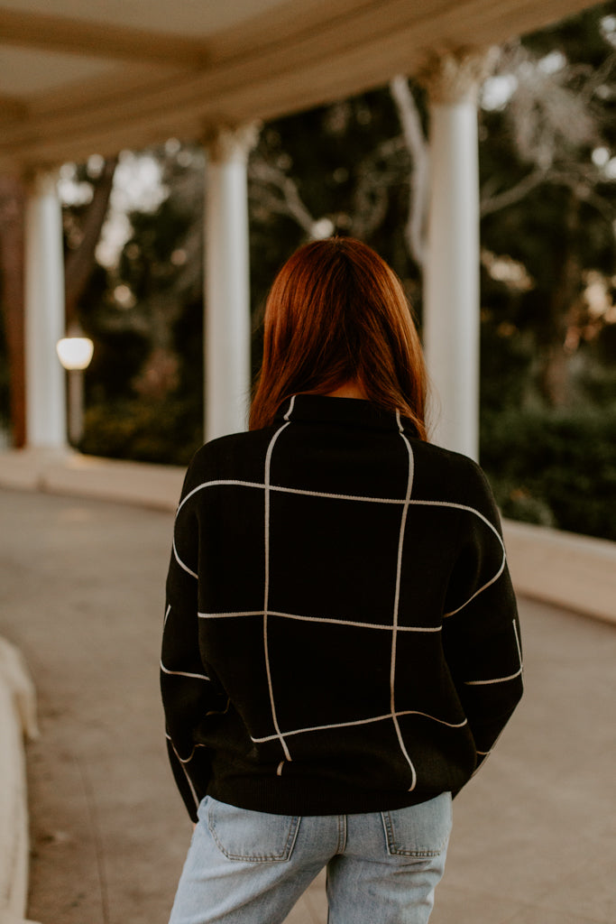 Black grid shop sweater